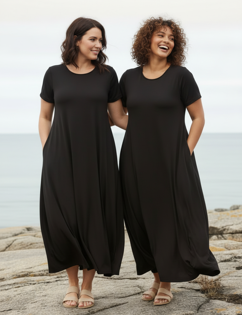 Två personer i svart Ballerina Original klänning – One Size och One Size Plus
