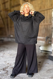 Schwarzes Poloshirt Embrace Black
