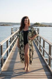 Kaftan öppen på brygga