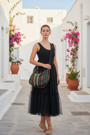 Väska med modell i medelhavsmiljö